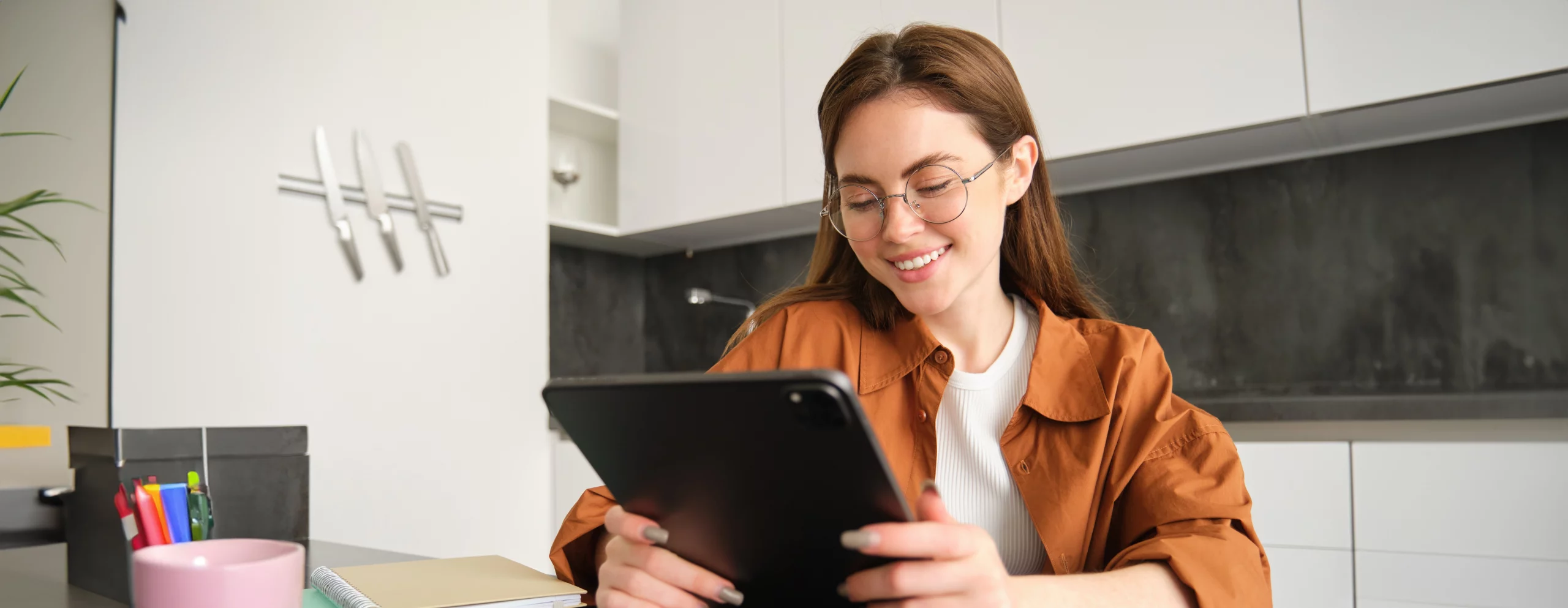 A reader viewing a Crossmots puzzle on a phone