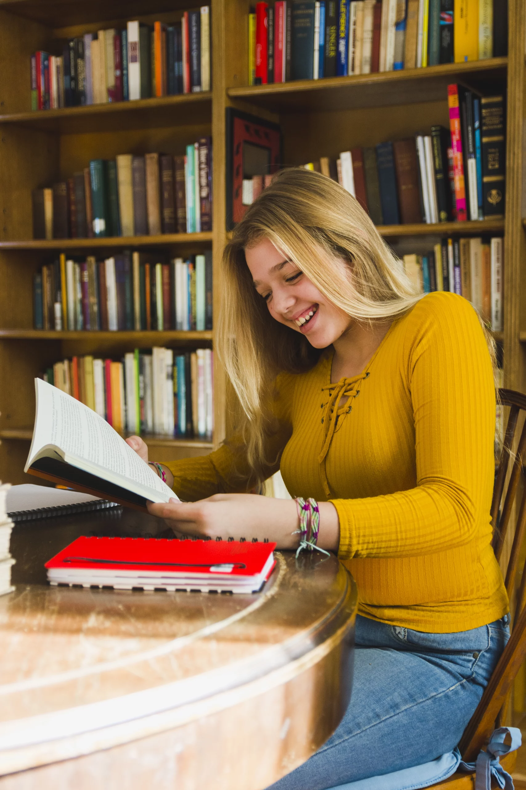 A reader browsing Crossmots puzzle books